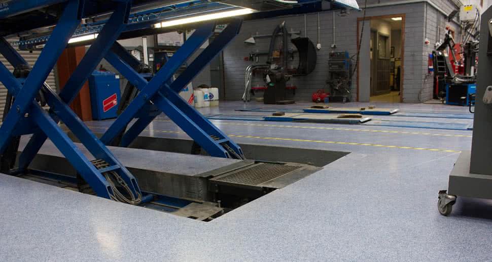 Auto service workshop safe flooring